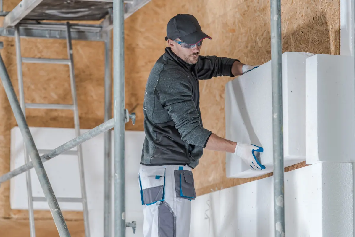 General contractor in Reno installing insulation